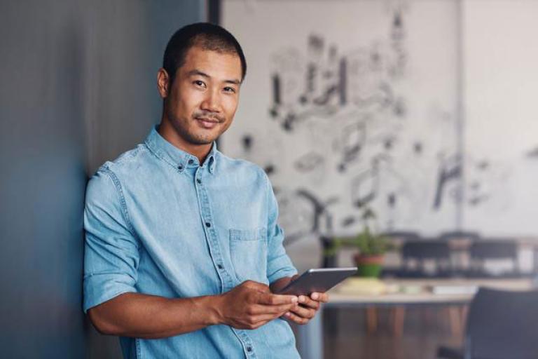 man with tablet